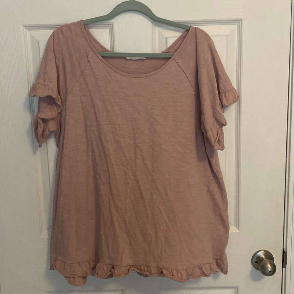 Ruffled sleeve blouse.